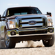 Image for article titled 2011 F-Series Super Duty: Ford Tows Chevy To Woodshed, Smacks It Around